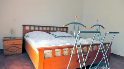 Ein Bett oder Betten in einem Zimmer der Unterkunft Ferienhaus Vineta