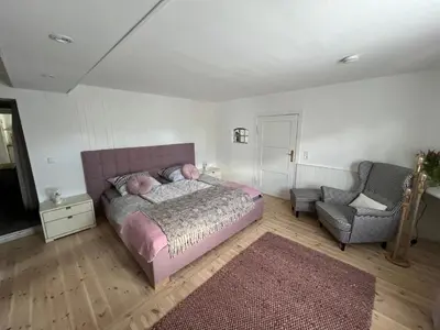 Ein Bett oder Betten in einem Zimmer der Unterkunft Naturwerk Ostsee