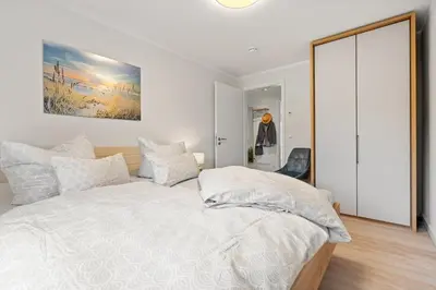 Ein Bett oder Betten in einem Zimmer der Unterkunft Rosenberg 43 Wg 6 1 Etage
