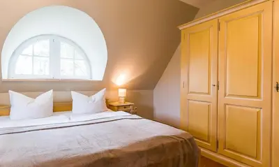 Ein Bett oder Betten in einem Zimmer der Unterkunft Krabbe