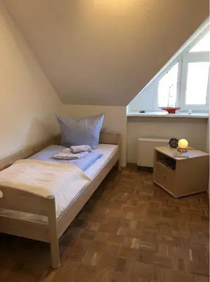 Ein Bett oder Betten in einem Zimmer der Unterkunft auf Kurs