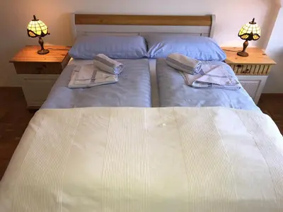 Ein Bett oder Betten in einem Zimmer der Unterkunft auf Kurs