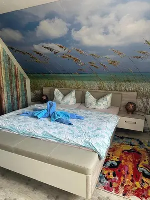 Ein Bett oder Betten in einem Zimmer der Unterkunft Seechick