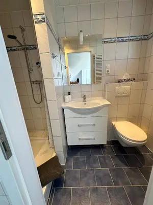 Ein Badezimmer in der Unterkunft Villa Blau Wohnung 03Studio