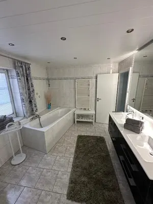 Ein Badezimmer in der Unterkunft Villa Blau Wohnung 01Suite