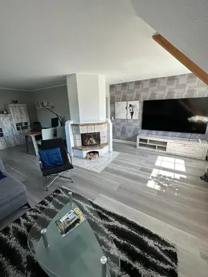 TV/Unterhaltungsangebot in der Unterkunft Villa Blau Wohnung 01Suite