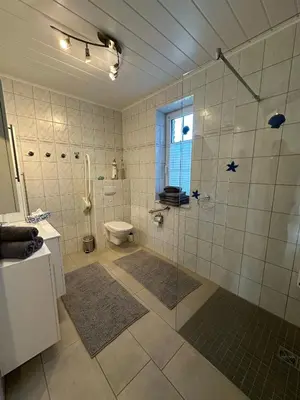 Ein Badezimmer in der Unterkunft Villa Blau Wohnung 02Appartment