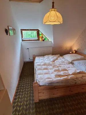 Ein Bett oder Betten in einem Zimmer der Unterkunft 
