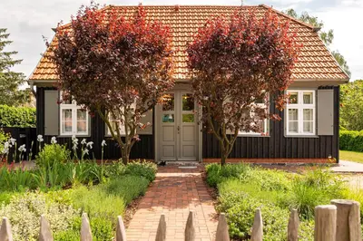 Ein Garten an der Unterkunft Kapitänshaus 