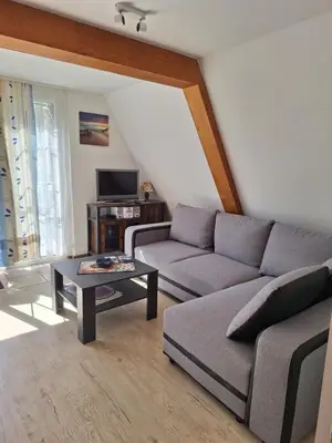 Ein Sitzbereich in der Unterkunft Finnhütte (Strandhütte) direkt am Strand