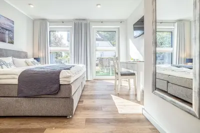 Ein Bett oder Betten in einem Zimmer der Unterkunft Ankerplatz 1