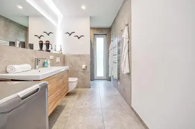 Ein Badezimmer in der Unterkunft Ankerplatz 1