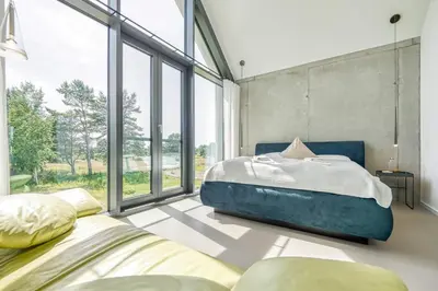 Ein Bett oder Betten in einem Zimmer der Unterkunft Ferienhaus Peak TWO