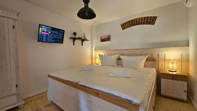 Ein Bett oder Betten in einem Zimmer der Unterkunft Speicherresidenz N 0,1