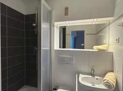 Ein Badezimmer in der Unterkunft Resi H5