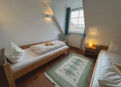Ein Bett oder Betten in einem Zimmer der Unterkunft Resi H5