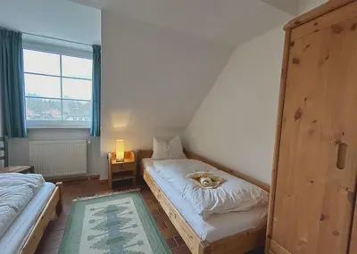 Ein Bett oder Betten in einem Zimmer der Unterkunft Resi H5
