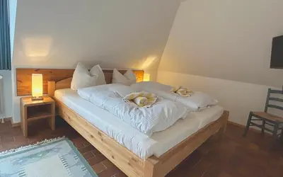 Ein Bett oder Betten in einem Zimmer der Unterkunft Resi H5