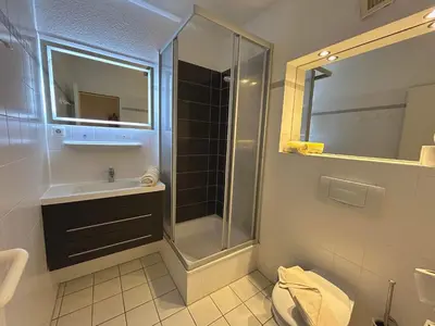 Ein Badezimmer in der Unterkunft Resi H5