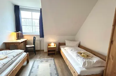 Ein Bett oder Betten in einem Zimmer der Unterkunft Resi M6