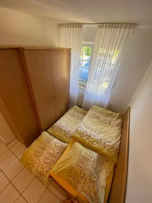 Ein Bett oder Betten in einem Zimmer der Unterkunft Fewo Kranich 36