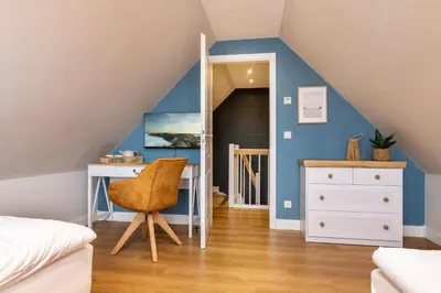 Ein Bett oder Betten in einem Zimmer der Unterkunft Störtebekers Perle
