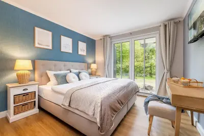 Ein Bett oder Betten in einem Zimmer der Unterkunft Fewo Strandappartements
