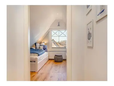 Ein Bett oder Betten in einem Zimmer der Unterkunft LieblingsPlatz Zingst