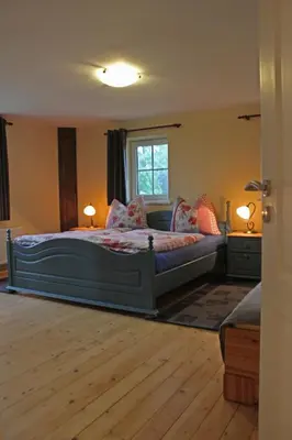 Ein Bett oder Betten in einem Zimmer der Unterkunft Bauernhaus Dierhagen
