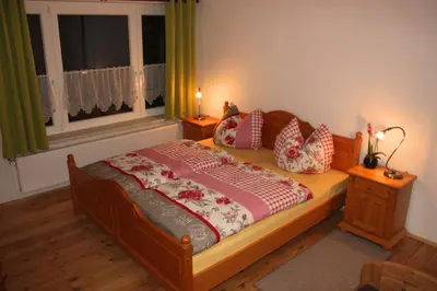 Ein Bett oder Betten in einem Zimmer der Unterkunft Bauernhaus Dierhagen