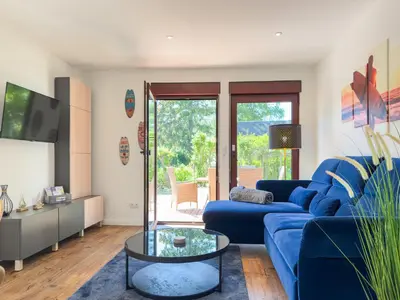 Ein Sitzbereich in der Unterkunft Haus am Strand