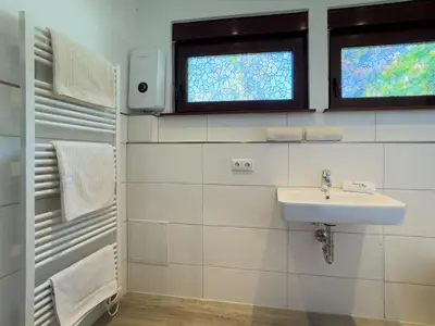 Ein Badezimmer in der Unterkunft Haus am Strand