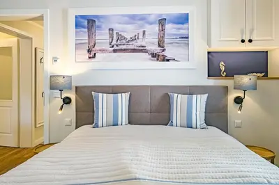 Ein Bett oder Betten in einem Zimmer der Unterkunft uns Leef