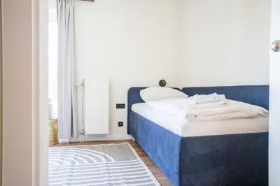 Ein Bett oder Betten in einem Zimmer der Unterkunft Johouse Zingst Johouse Zimmer 13