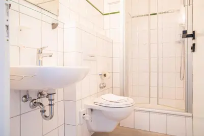 Ein Badezimmer in der Unterkunft Johouse Zingst Johouse Zimmer 13