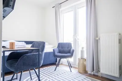 Ein Sitzbereich in der Unterkunft Johouse Zingst Johouse Zimmer 13