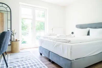 Ein Bett oder Betten in einem Zimmer der Unterkunft Johouse Zingst Johouse Zimmer 11