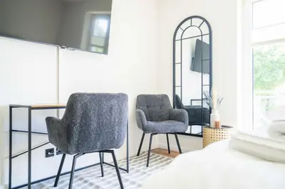 Ein Sitzbereich in der Unterkunft Johouse Zingst Johouse Zimmer 11