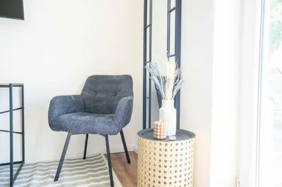 Ein Sitzbereich in der Unterkunft Johouse Zingst Johouse Zimmer 11