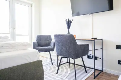Ein Sitzbereich in der Unterkunft Johouse Zingst Johouse Zimmer 12
