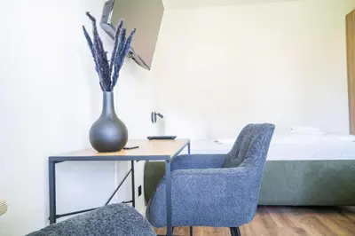 Ein Sitzbereich in der Unterkunft Johouse Zingst Johouse Zimmer 12