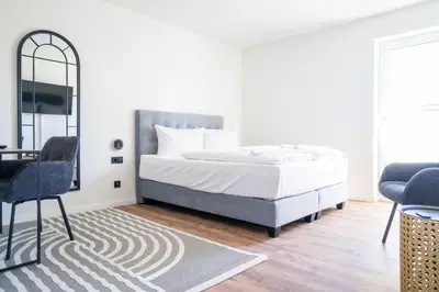 Ein Bett oder Betten in einem Zimmer der Unterkunft Johouse Zingst Johouse Zimmer 06