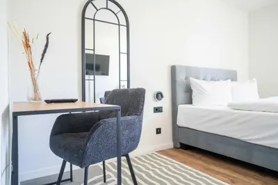 Ein Bett oder Betten in einem Zimmer der Unterkunft Johouse Zingst Johouse Zimmer 06