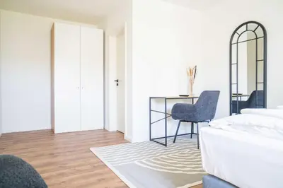 Ein Bett oder Betten in einem Zimmer der Unterkunft Johouse Zingst Johouse Zimmer 06