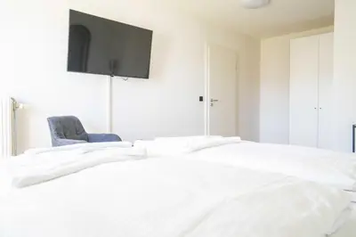 Ein Bett oder Betten in einem Zimmer der Unterkunft Johouse Zingst Johouse Zimmer 06