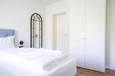 Ein Bett oder Betten in einem Zimmer der Unterkunft Johouse Zingst Johouse Zimmer 04