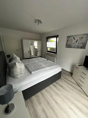 Ein Bett oder Betten in einem Zimmer der Unterkunft Haus am Bodden