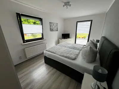 Ein Bett oder Betten in einem Zimmer der Unterkunft Haus am Bodden