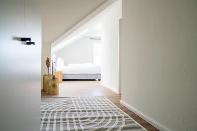 Ein Bett oder Betten in einem Zimmer der Unterkunft Johouse Zingst Johouse Zimmer 17