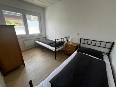 Ein Bett oder Betten in einem Zimmer der Unterkunft Ferienhaus Maite